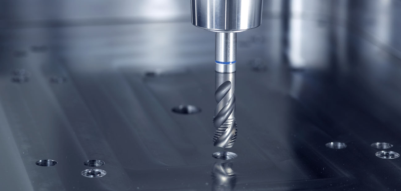 Professional use of a tap in metalworking