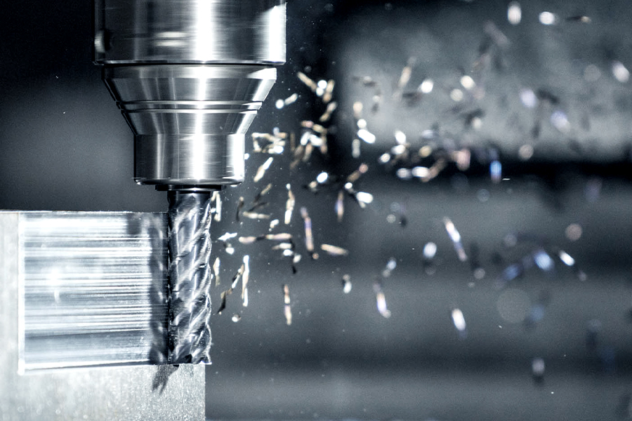 The image shows an HPC milling cutter during the milling process, in which material is removed from a workpiece.