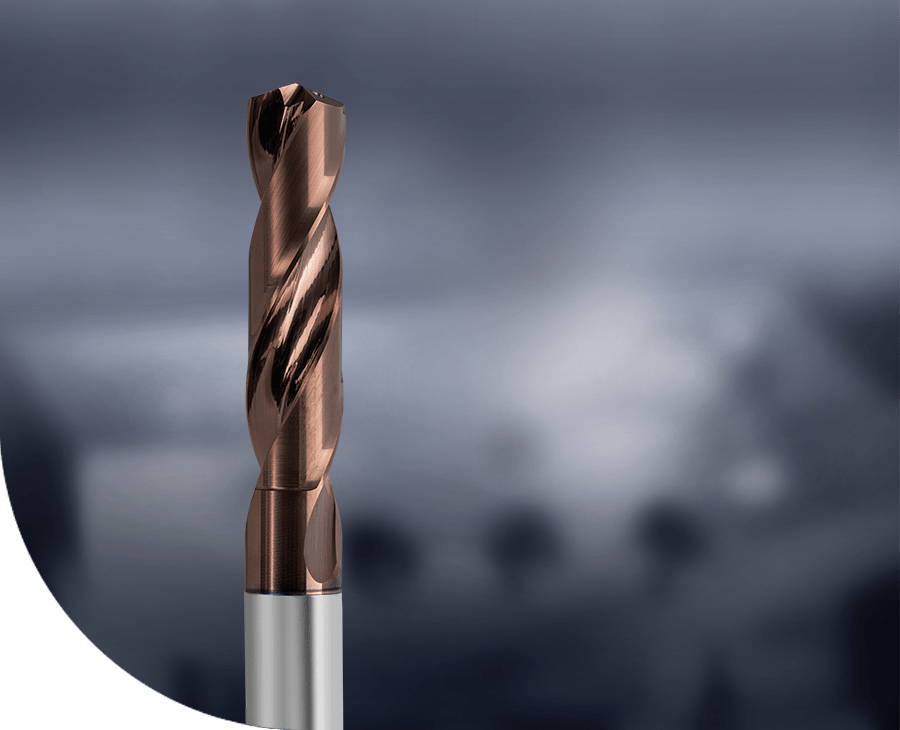 Close-up of an InoxPro solid carbide drill bit in the context of an industrial environment