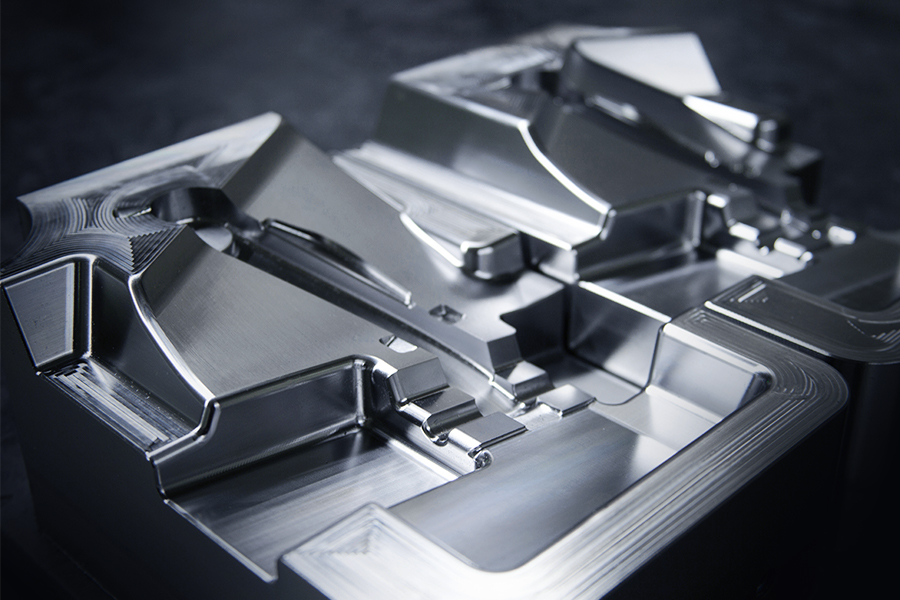 Detailed view of precise metal components in tool and mould making