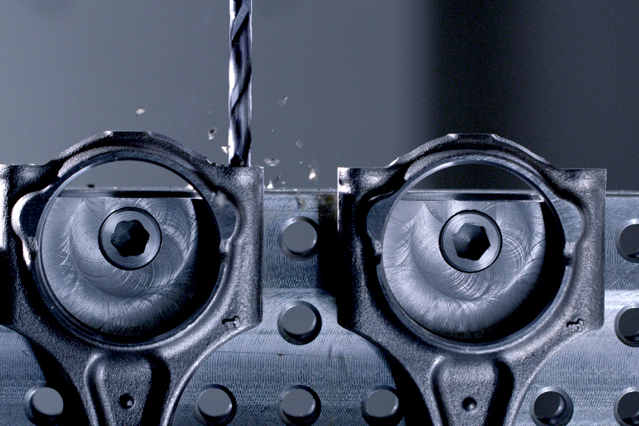 Precision machining with a carbide drill on a metal component