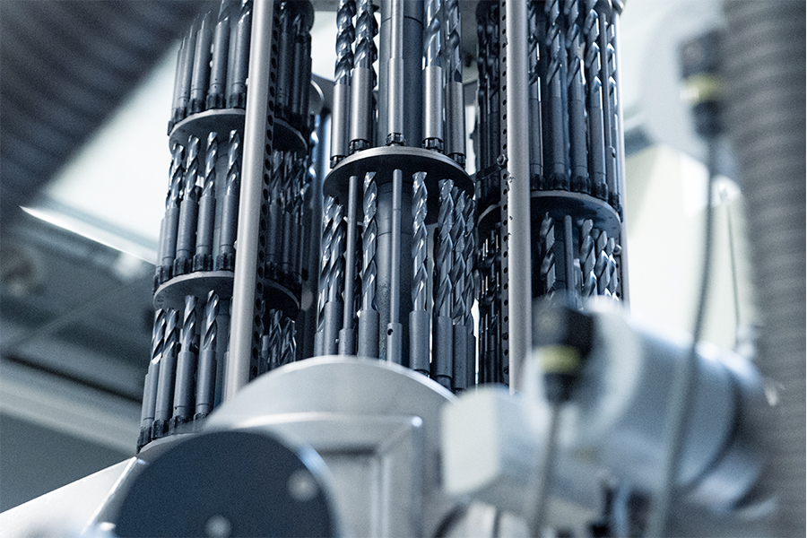Close-up of numerous high-precision metal drill bits