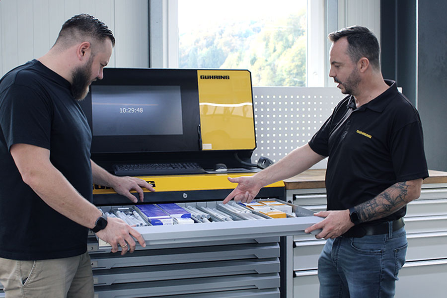 Two employees in a tool management area with a standard product of precision tools