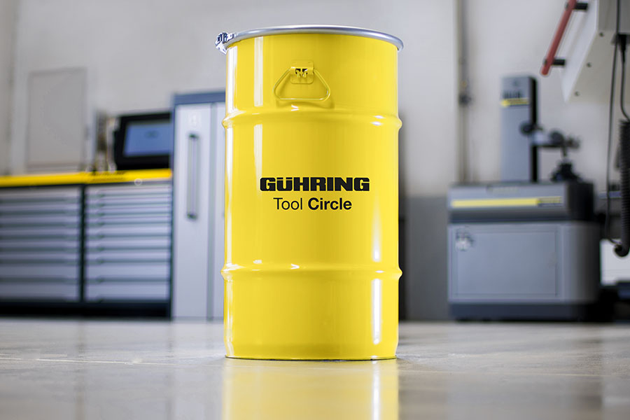 Yellow Gühring tool container in tool circle design, strategically placed in a modern workshop