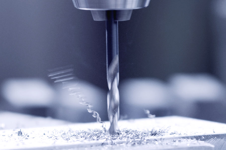 Precision machine work when drilling out a tap