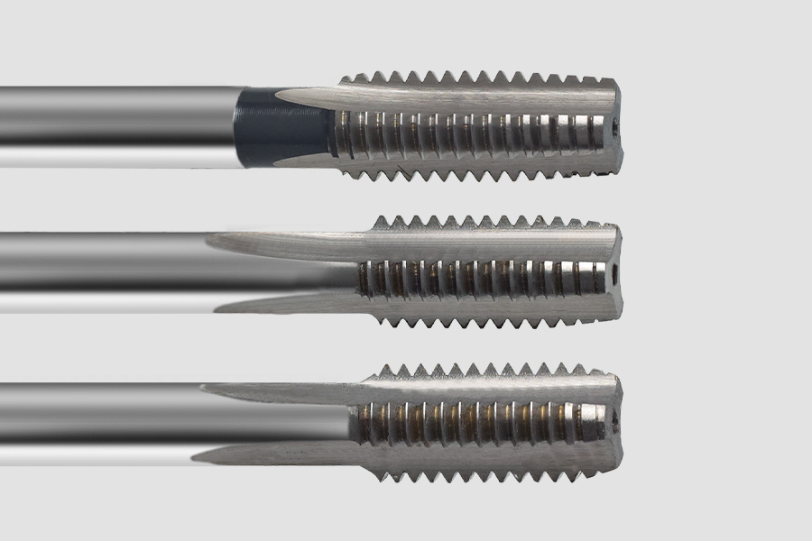 Three different types of thread cutters for hand drills in side view, presented in a row