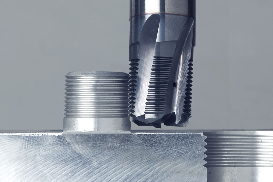 Gühring tool for producing internal and external threads on a textured metal surface