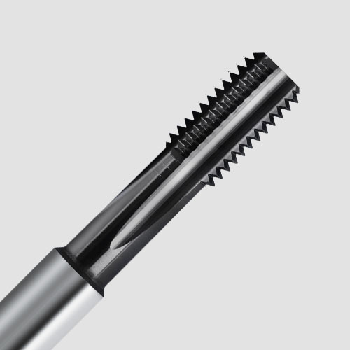 Detailed view of a machine tap for metric ISO threads