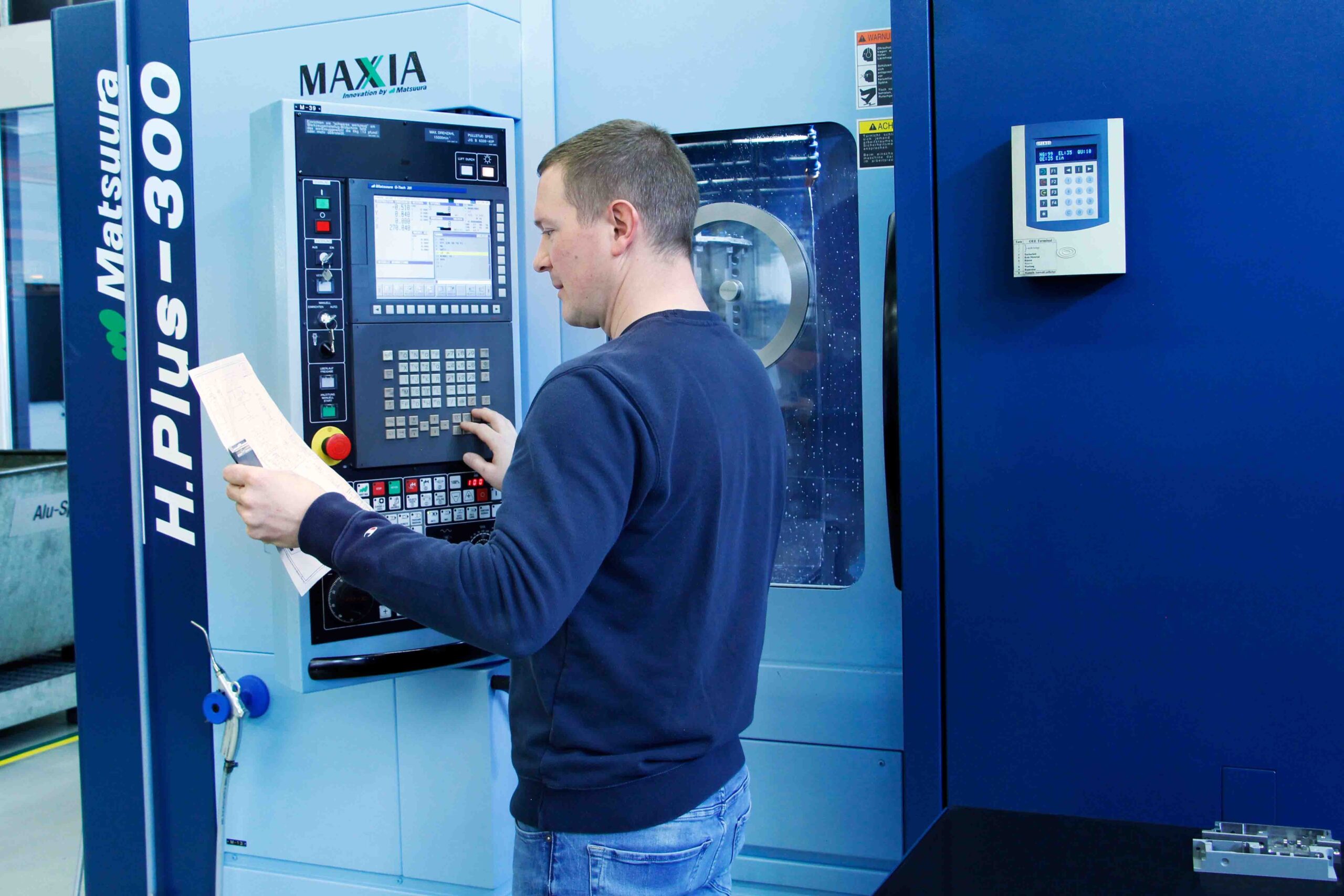 Patrick Matysiak an der Maschine